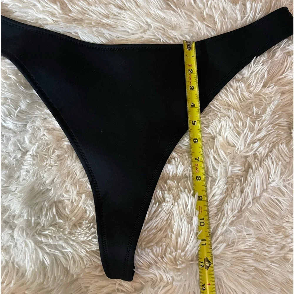 Skims swim tanga onyx thong bottom